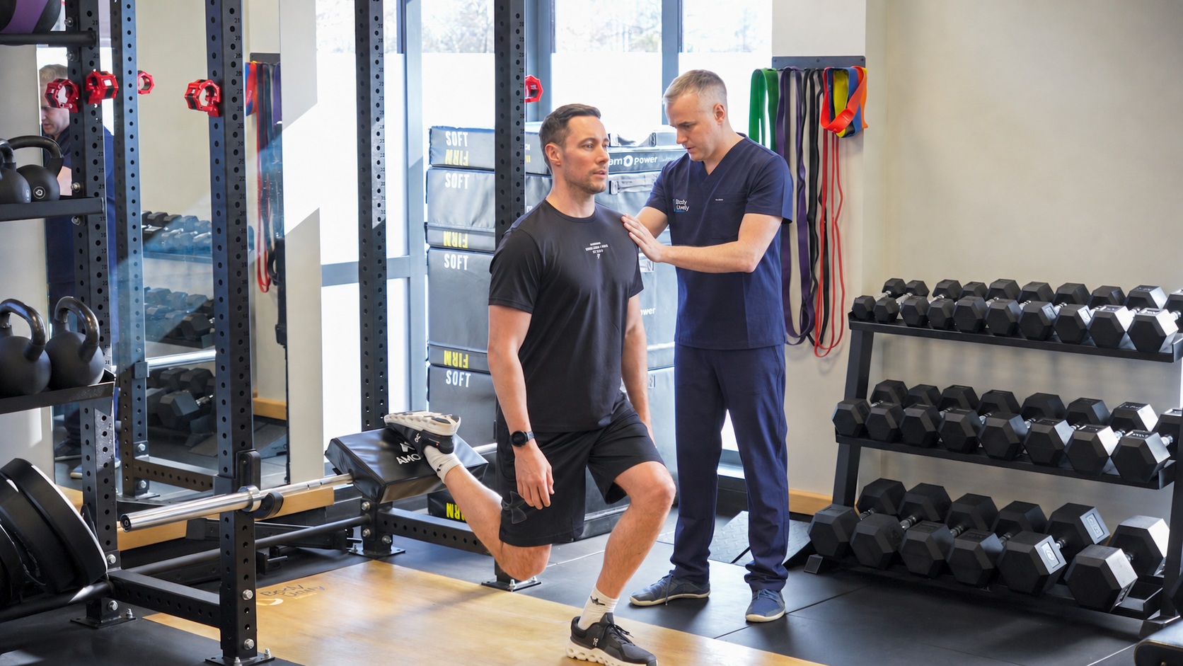 Body Unity practitioner guiding a patient through movement rehabilitation